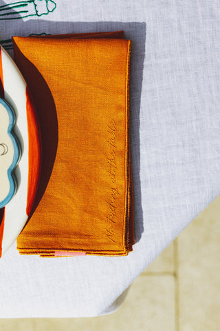 karavan clothing spring summer homeware collection linen napkin orange