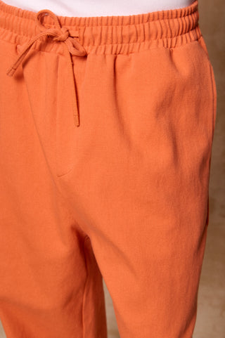 karavan clothing fashion spring summer 26 men nai collection mark trousers orange