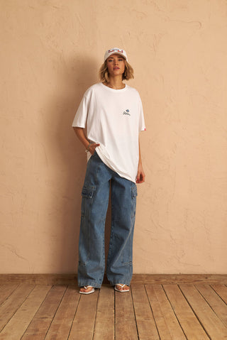 karavan clothing fashion spring summer 25 dino tee eye logo